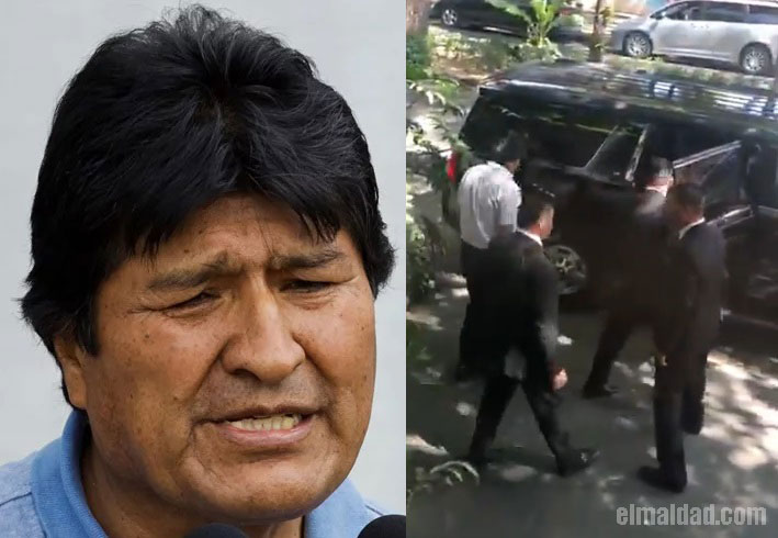 Evo Morales fue captado saliendo de un restaurante fifí con una escolta de 3 hombres.