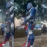 Policía mamila discute con Optimus Prime.