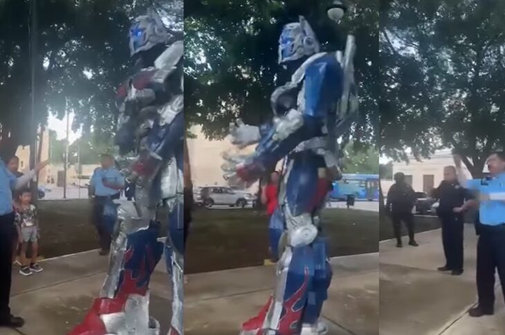 Policía mamila discute con Optimus Prime.