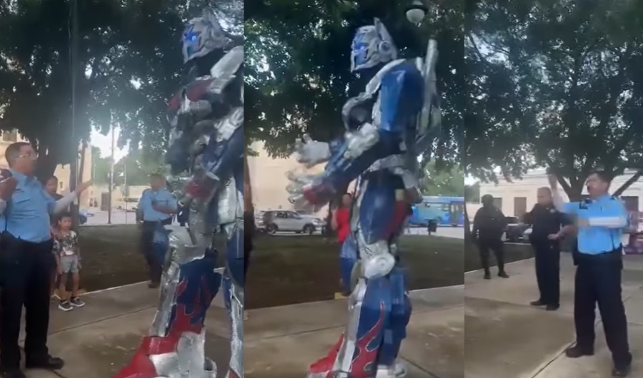 Policía mamila discute con Optimus Prime.