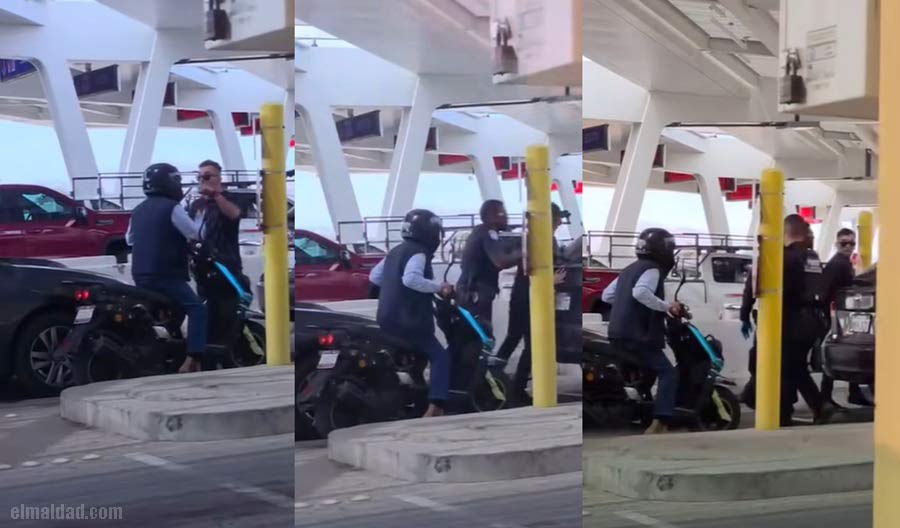 Automovilista vs motero chafa en la garita.